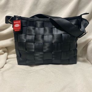 Harvey’s black seatbelt purse